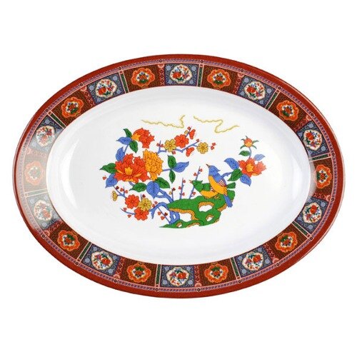 A Thunder Group oval melamine platter with a peacock and floral design.