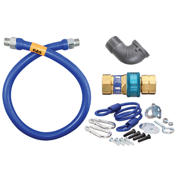A blue Dormont gas connector hose kit with metal fittings and a restraining cable.