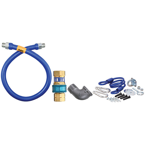 A blue Dormont gas connector kit with restraining cable and elbow.