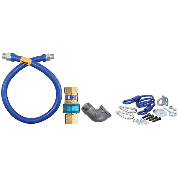 A blue Dormont gas connector kit with elbow and restraining cable.