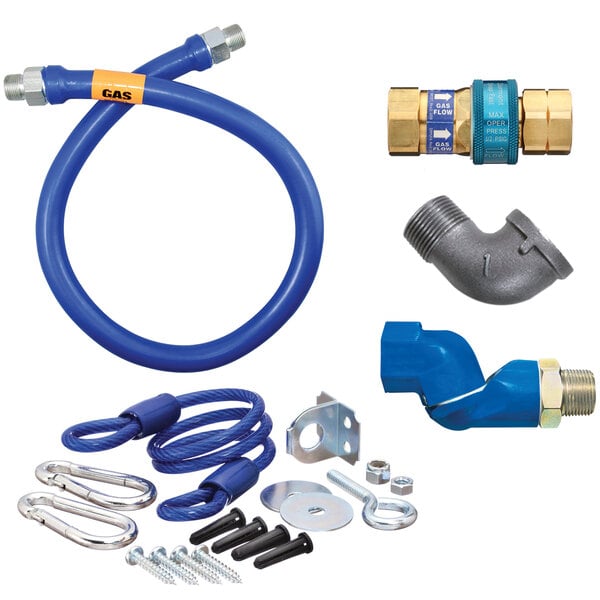 A blue Dormont gas connector hose kit with various parts including a swivel elbow.