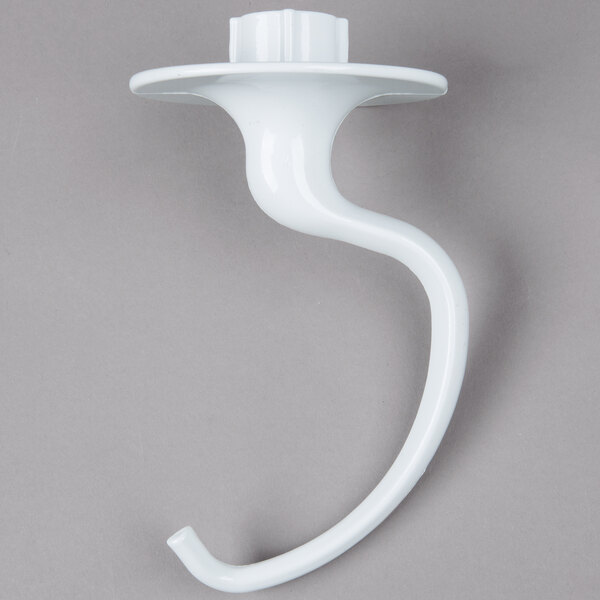 A white plastic coated dough hook with a curved shape and a white handle.