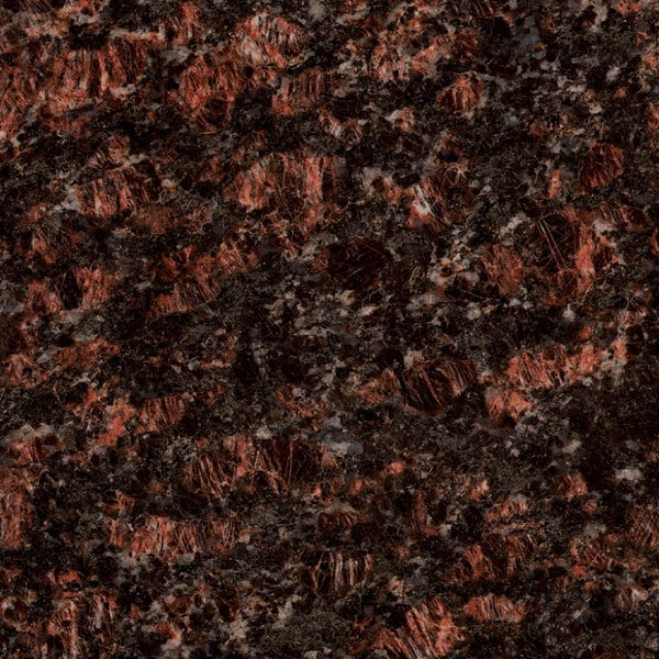A close up of a tan brown granite stone surface.
