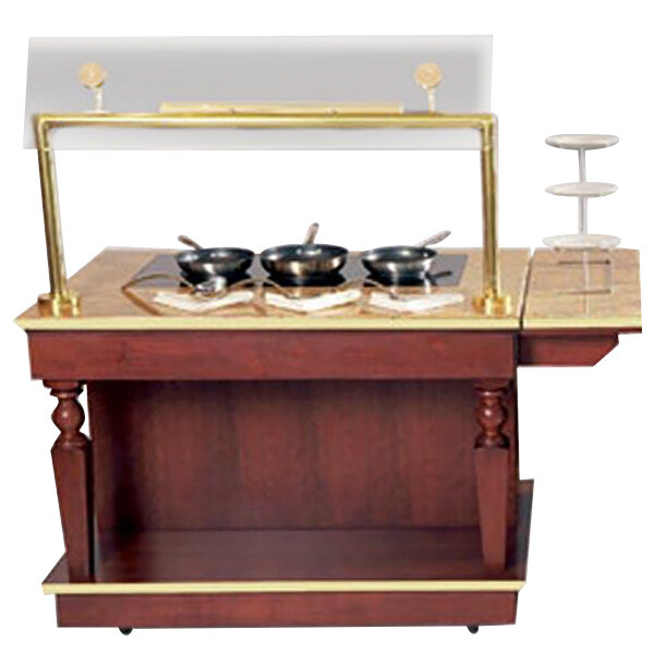 A Bon Chef wood kitchen cart with pans on top.