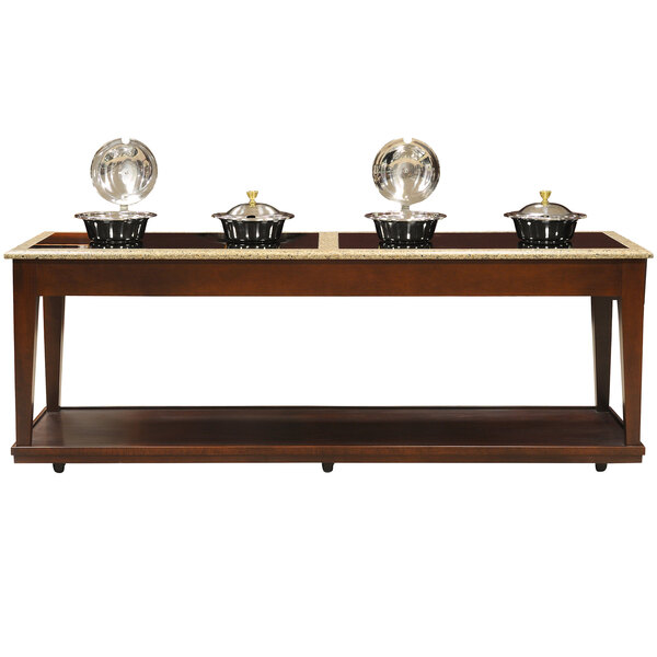 A Bon Chef wood buffet table with bowls on top.