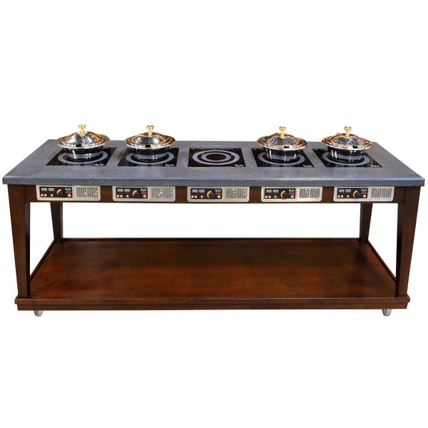 A Bon Chef contemporary wood buffet with 5 induction ranges and pots on top.