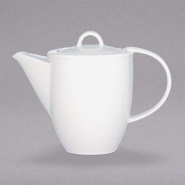 The lid for a Villeroy & Boch white porcelain teapot.