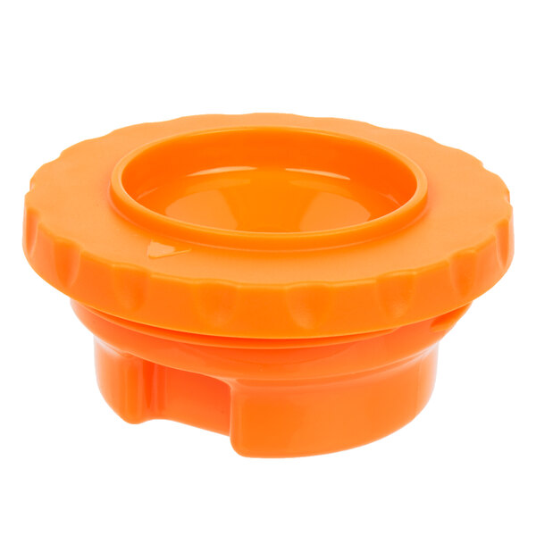 An orange plastic container with a white circle lid.
