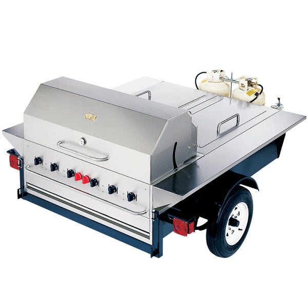 A Crown Verity portable stainless steel grill with a gas burner.