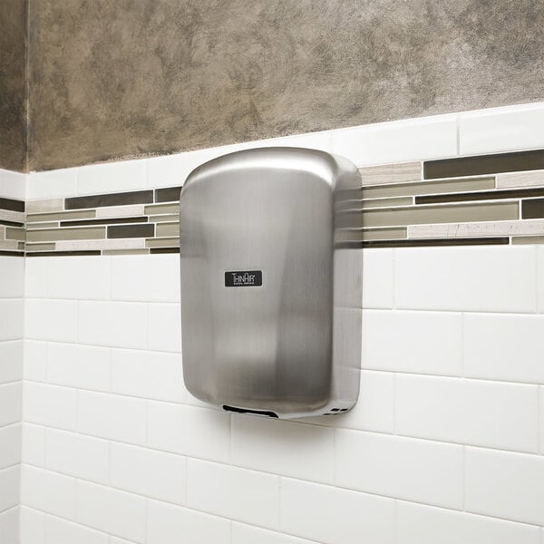 An Excel ThinAir hand dryer with brushed stainless steel cover on a white wall.