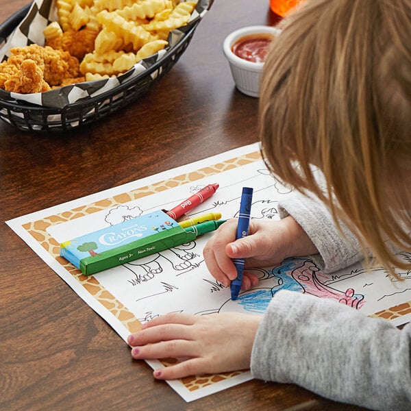 A child coloring with Choice kids restaurant crayons on a paper.
