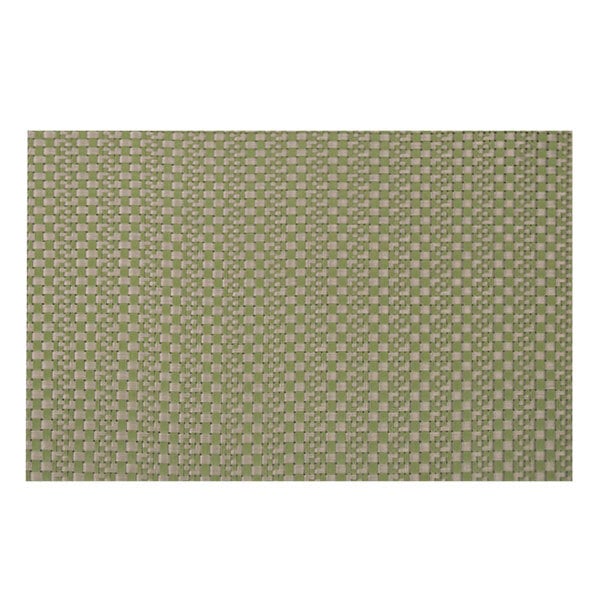 A close-up of a Snap Drape Pompeii Pistachio placemat with a green and white pattern with small dots.