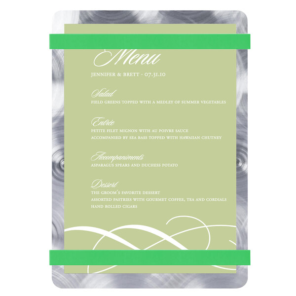 A white menu card with text and swirls on green bands with silver foil.