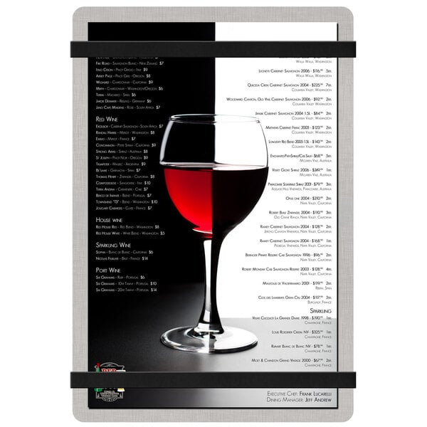 A Menu Solutions Alumitique menu board with black bands and a glass of red wine.