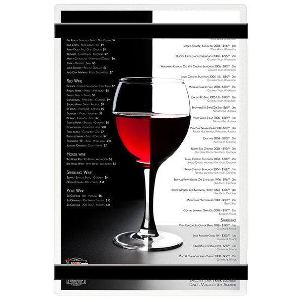 A Menu Solutions clear frosted acrylic menu board with rubber bands on a wine glass.