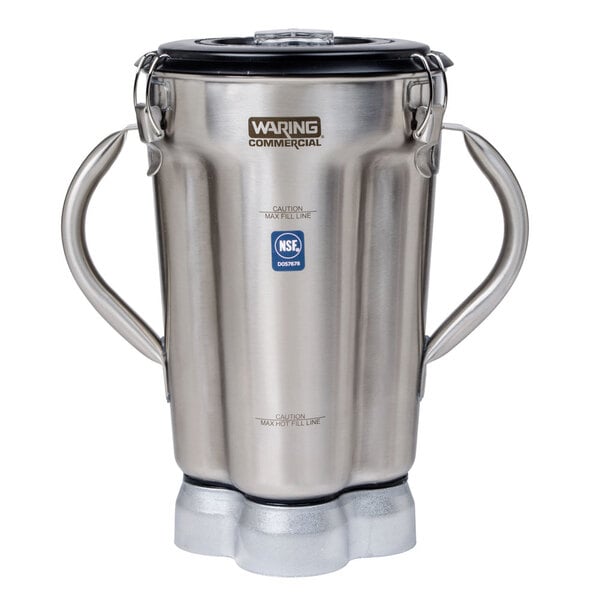 A stainless steel Waring blender container with two black handles.