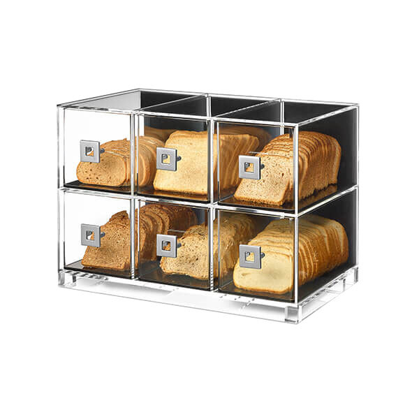 A clear acrylic container with slices of bread in it.