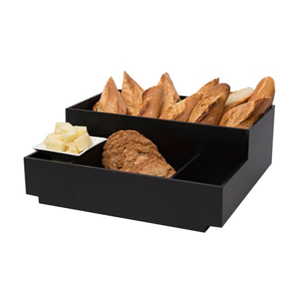 A black Rosseto coffee condiment holder with food in it.
