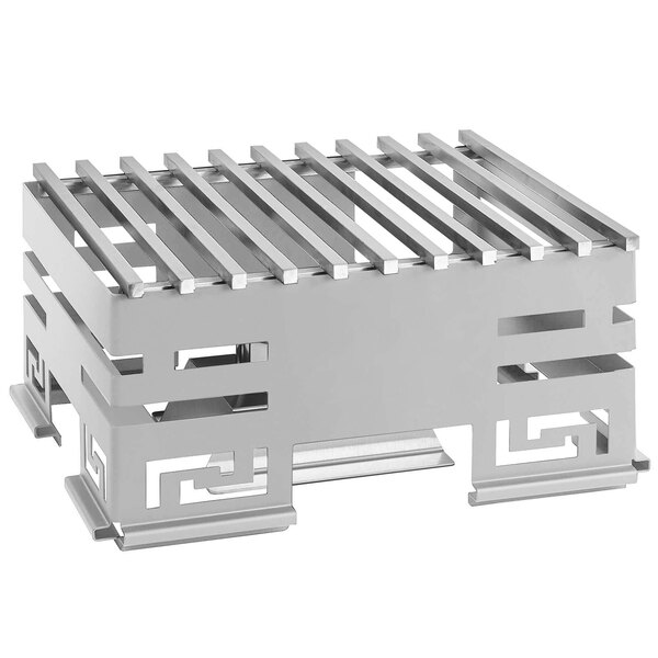 A stainless steel metal grill on a stand.