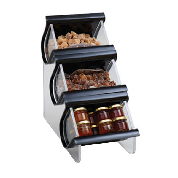 A black Rosseto condiment organizer with three clear compartments holding different types of food.