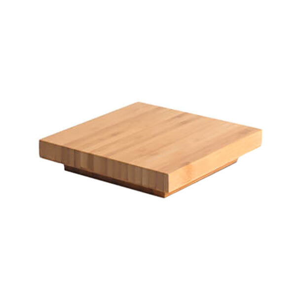A Rosseto natural bamboo square cap on a table.