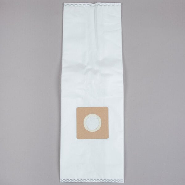 A white Lavex vacuum bag with a brown and white circle on it.