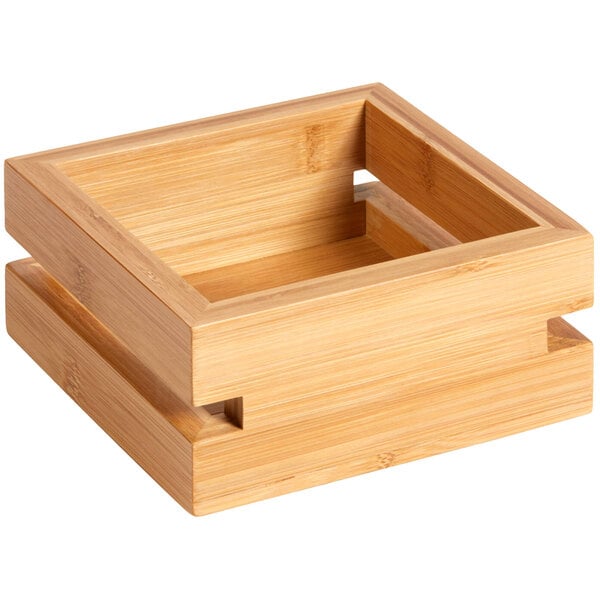 A small bamboo tray with two compartments.