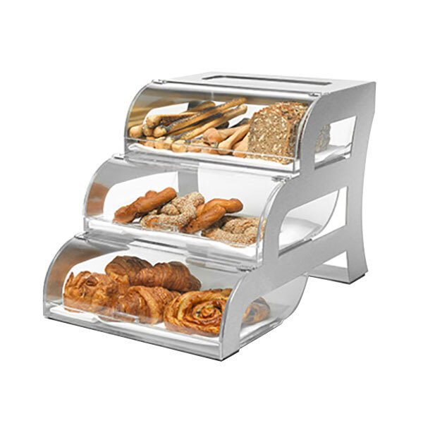 A three-tiered Rosseto bakery display case with bread and pastries.