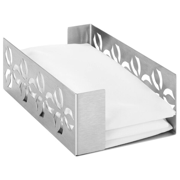 A stainless steel Rosseto napkin holder on a table with a white napkin inside.