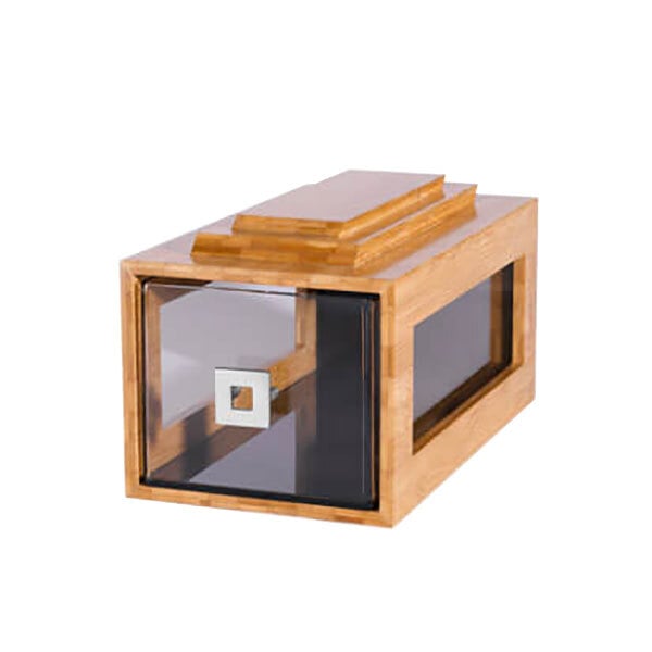 A small wooden bakery building block with glass drawers.