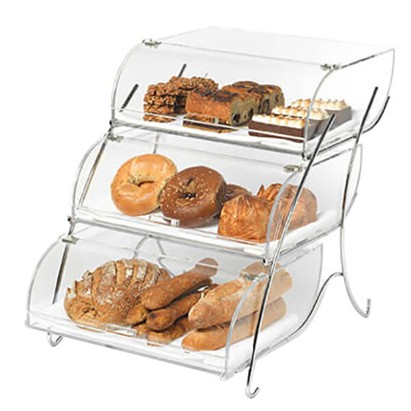 A three-tiered Rosseto bakery display case filled with bread and pastries.