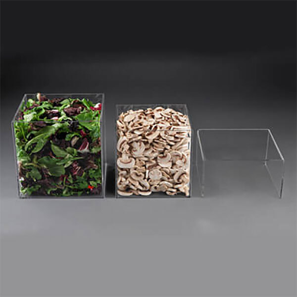 A group of clear containers with salad and mushrooms inside.