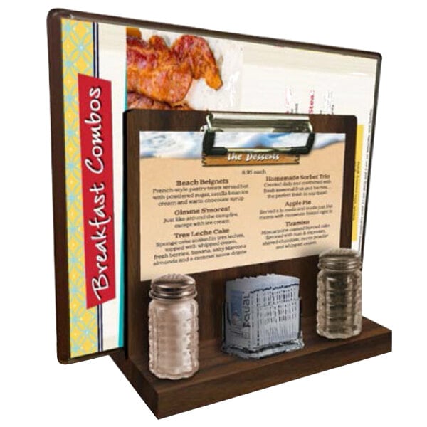 A Menu Solutions walnut wood tabletop menu caddy with a menu and a bottle on a table.