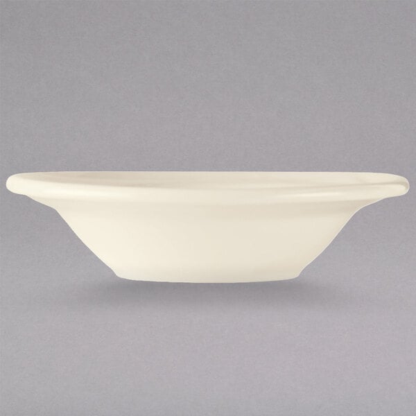 A Libbey cream white china grapefruit bowl.