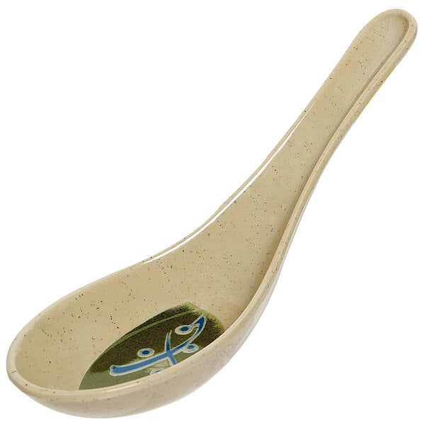 A white GET Japanese melamine soup spoon with a green and blue design.