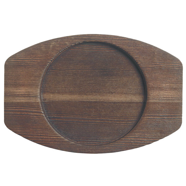 A wooden surface with an oval shaped Libbey cedar plank underliner.