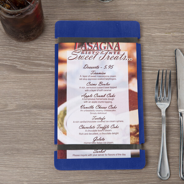 A Menu Solutions wood menu board with rubber band straps on a table in an Italian restaurant.