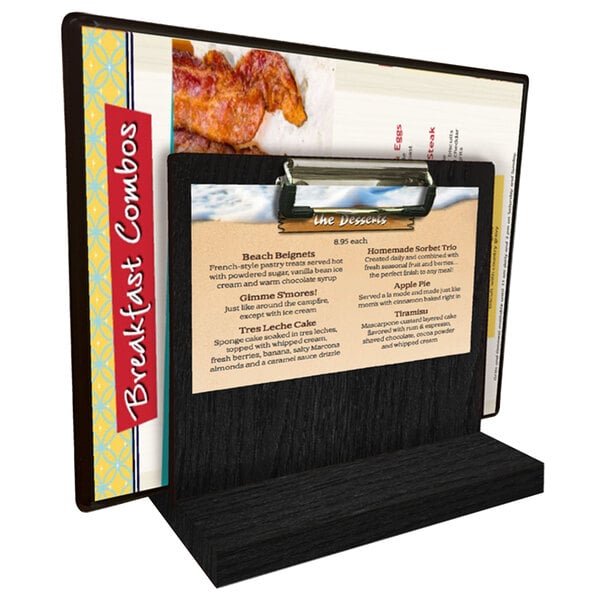 A Menu Solutions black wood tabletop menu caddy with a menu clipped to it.