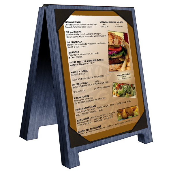 A denim wood Menu Solutions table tent with picture corners holding a menu with a picture of a burger.