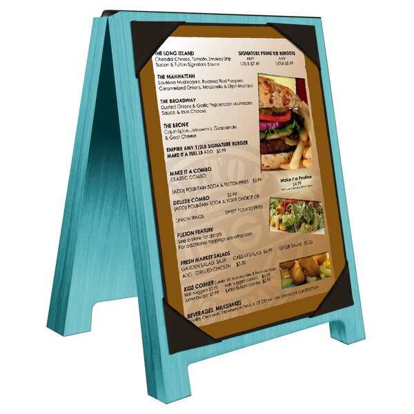 A Menu Solutions sky blue wood menu board tent with picture corners holding a menu with a picture of food.