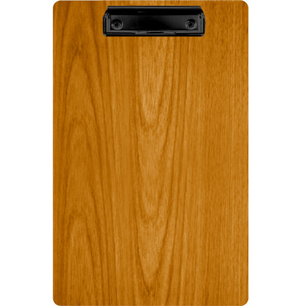 A Menu Solutions Country Oak wood clipboard with black clip.