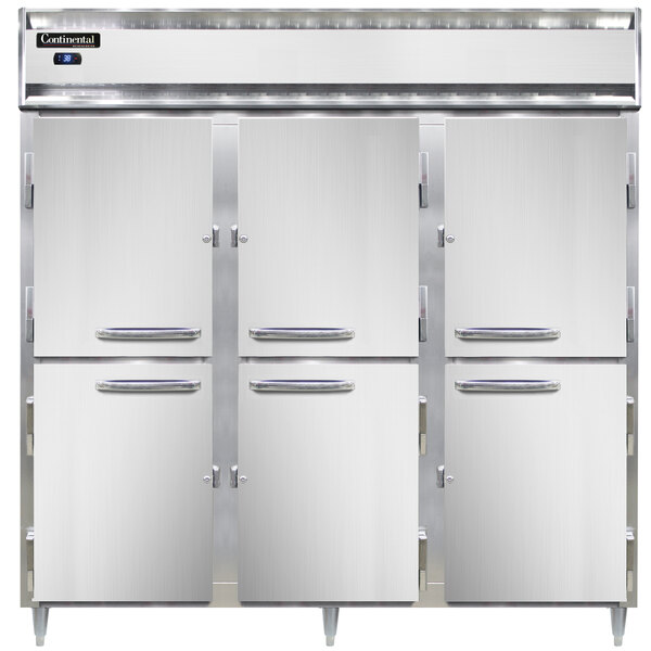 Three Continental stainless steel pass-through refrigerators with open half doors.