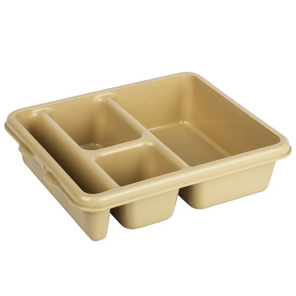 A tan plastic tray with four compartments.