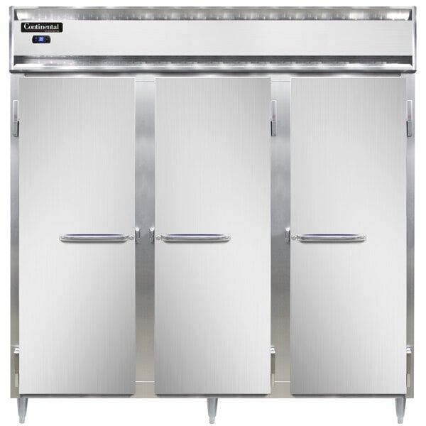 The open stainless steel doors of a Continental pass-through refrigerator.