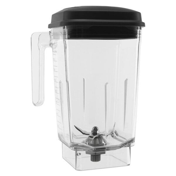 A clear plastic KitchenAid blender jar with a black lid.