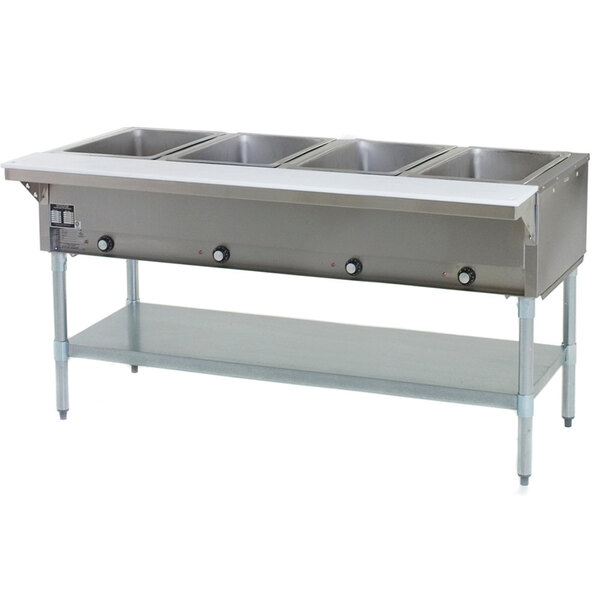 An Eagle Group stainless steel liquid propane steam table with four pans on a counter.