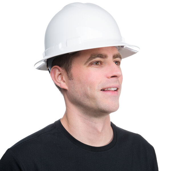 A man wearing a white Cordova Duo full-brim hard hat.