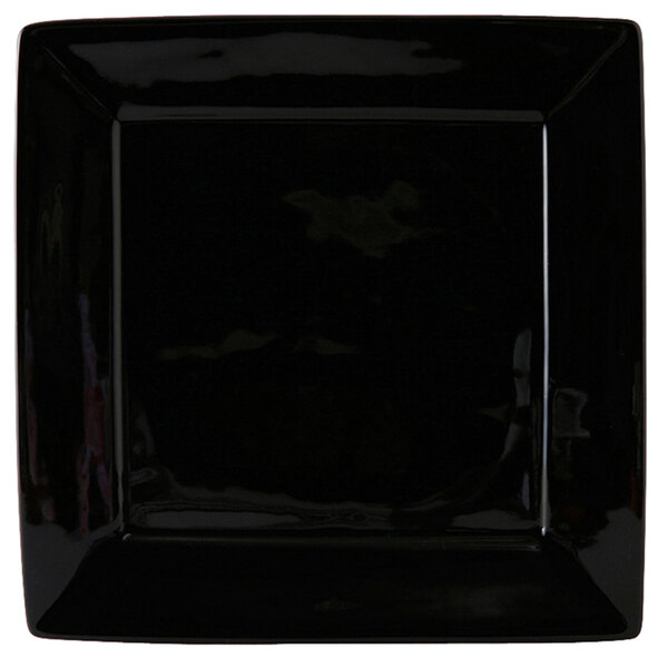 A black square Tuxton china plate.