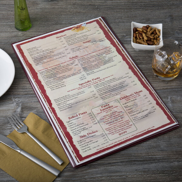 A Menu Solutions Hamilton menu board on a table in an Italian restaurant.