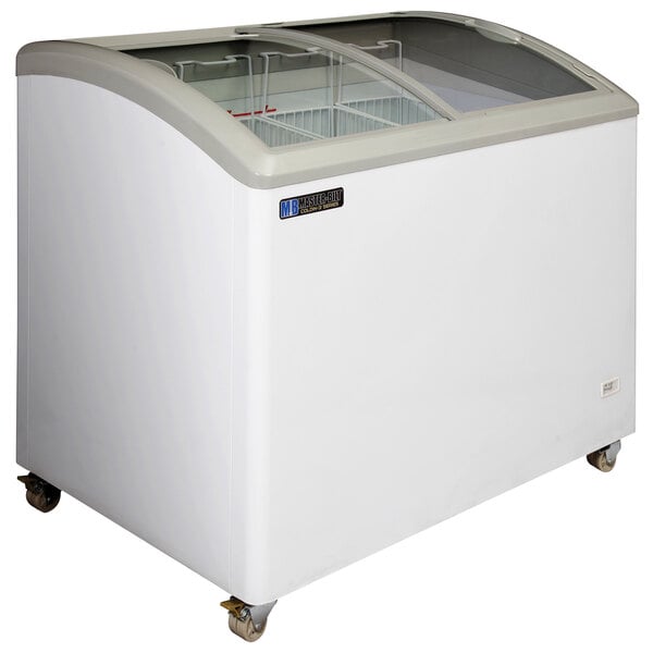 A white Master-Bilt curved top display freezer with glass doors.